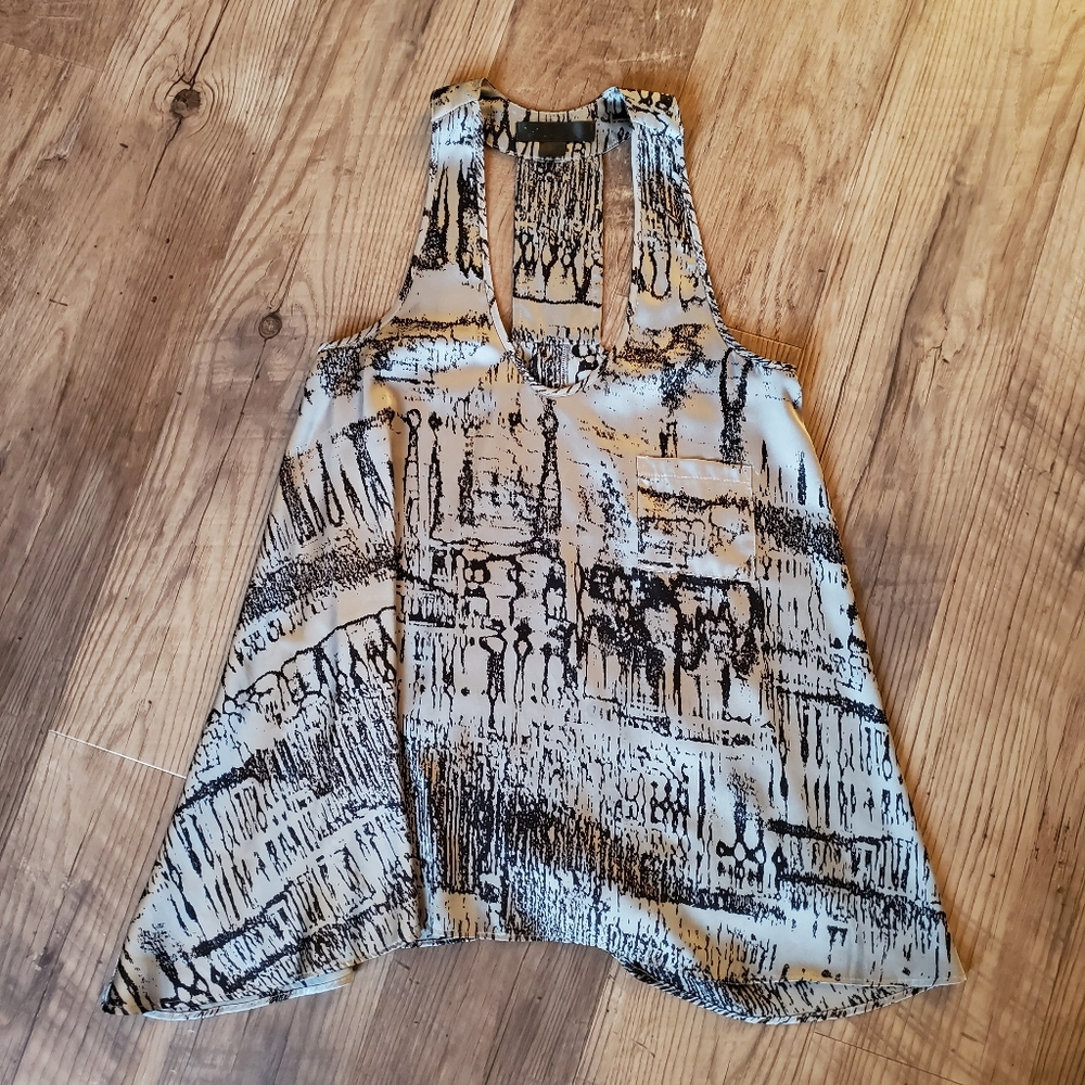 Silver and black loose tank with pocket. Size: XS
